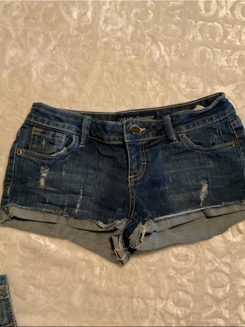 Women’s Dark Blue Distressed Denim Cutoff Shorts